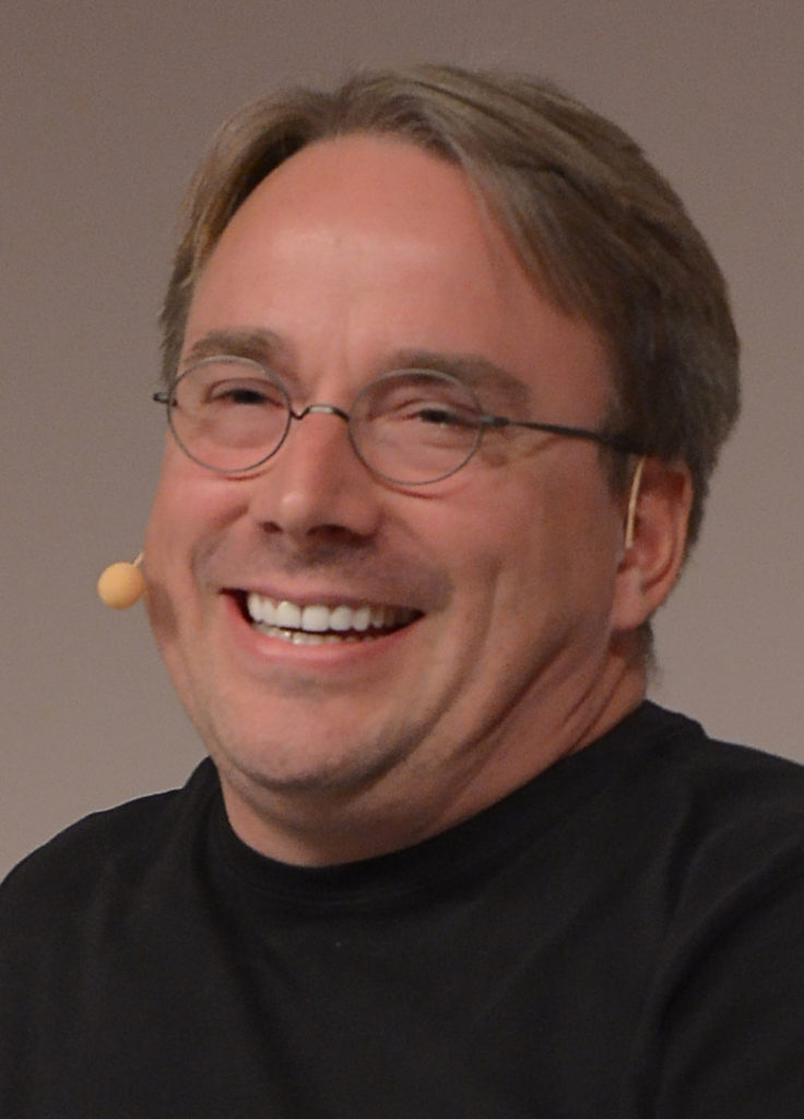 A cropped and rotated version of an image of Linus Torvalds speaking at the LinuxCon Europe 2014 in Düsseldorf